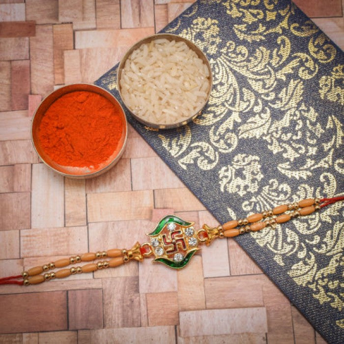 Beautiful Swastik And Stone Rakhi