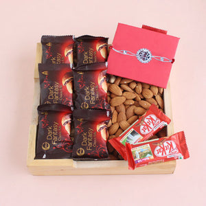 Om Rakhi with Appetizing Goodies